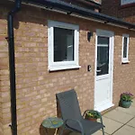 Cosy Garden Studio Room Minimum Two Night Booking